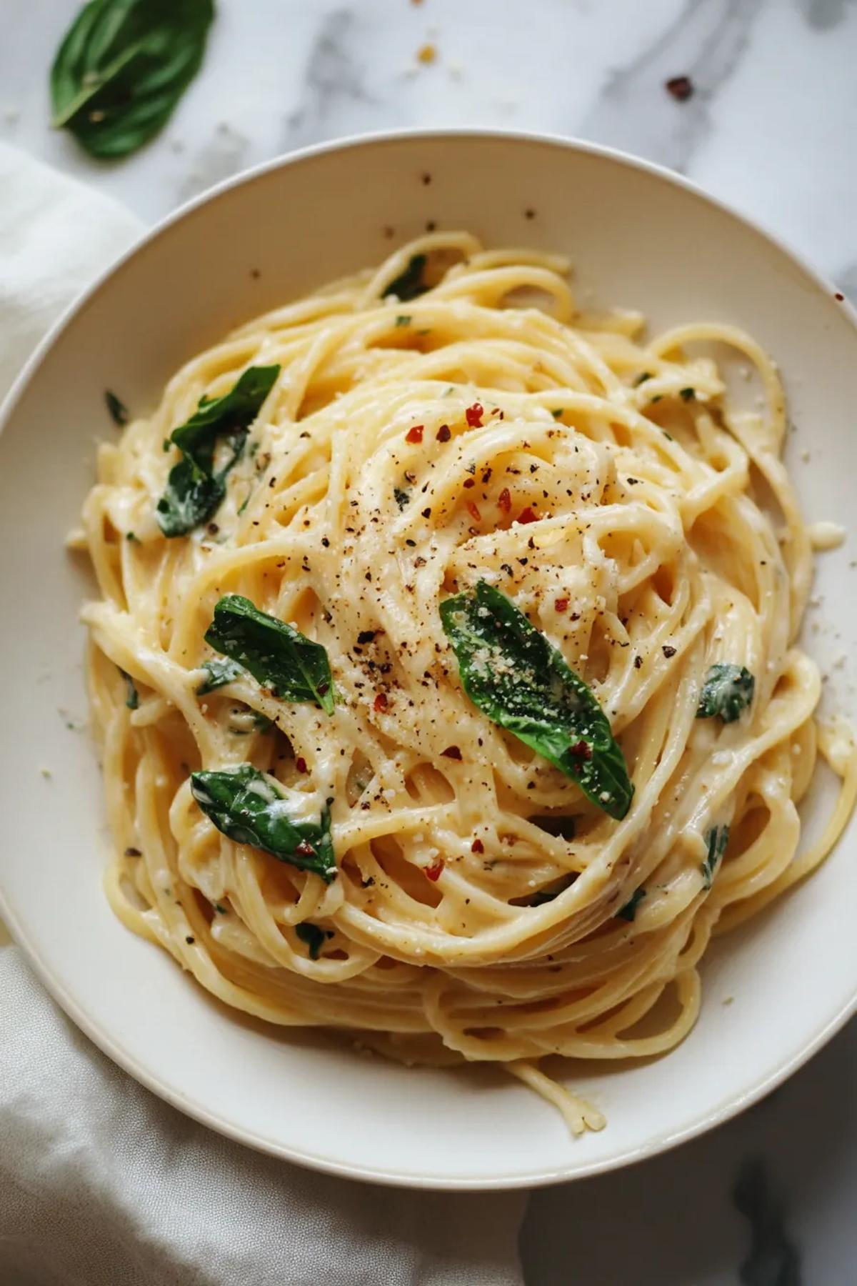 A delectable bowl of one pot miso mascarpone pasta nyt, featuring creamy sauce, fresh herbs, and a sprinkle of parmesan, served in a rustic ceramic dish.