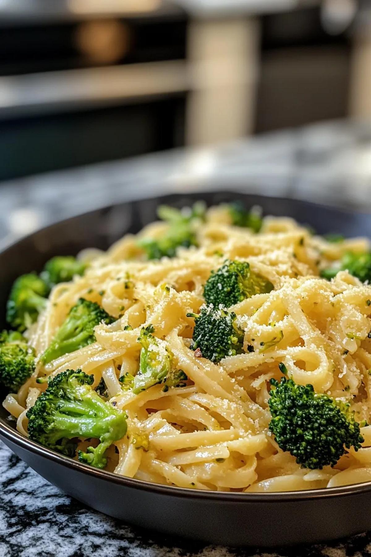 A vibrant bowl of one pot broccoli pasta vegan, featuring tender broccoli, al dente pasta, and a sprinkle of fresh herbs, all beautifully plated. card